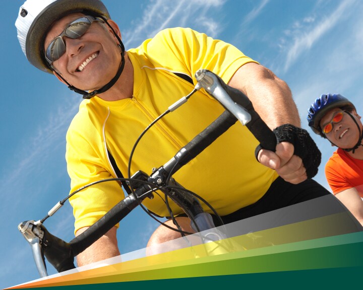 Middle aged men cycling